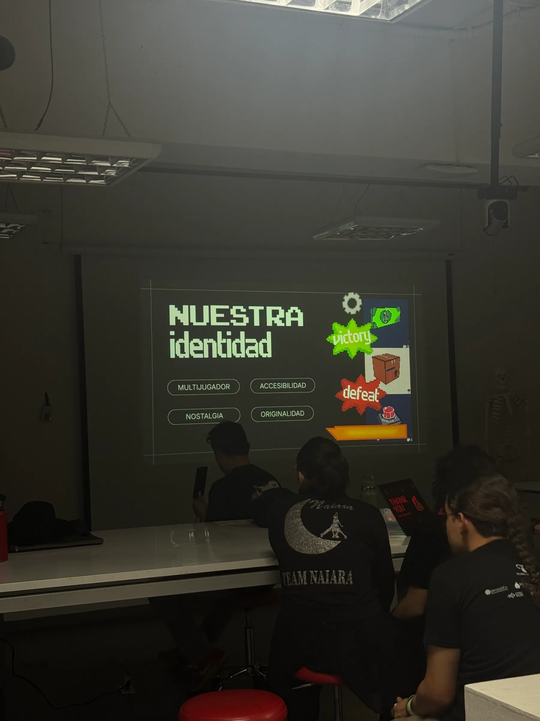 The Interact2Hack event logo overlaid on a table