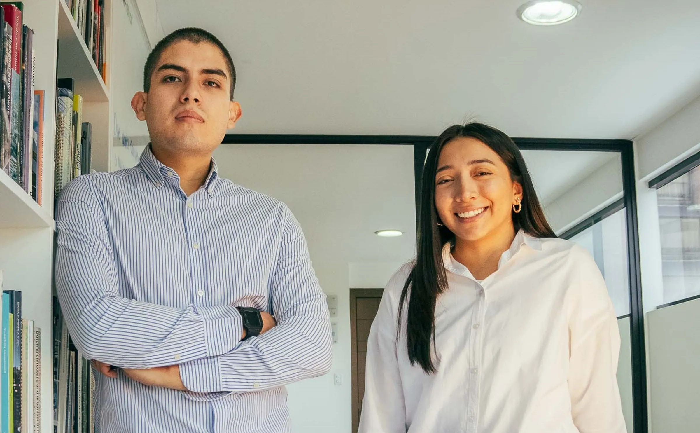 The two We Social founders standing together in their studio